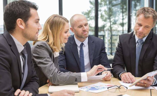 group of business people having meeting in office