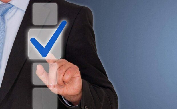 businessman with blue check box