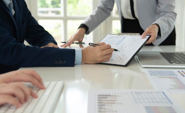 analyst checking in financial statement for audit internal control system