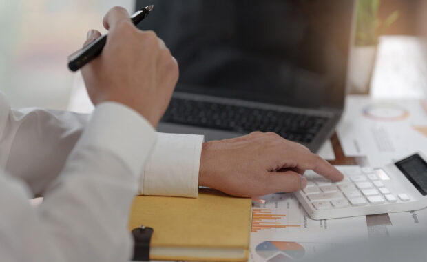 administration or accountant discussing with partner are meeting to audit finance planning sales to meet targets set in next year