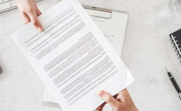 business people are exchanging document