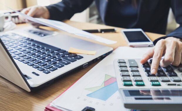 businessman working on desk office business financial accounting calculate