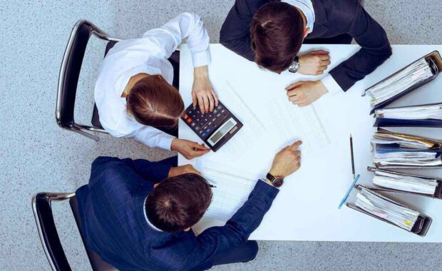 bookkeeper or financial inspector making report